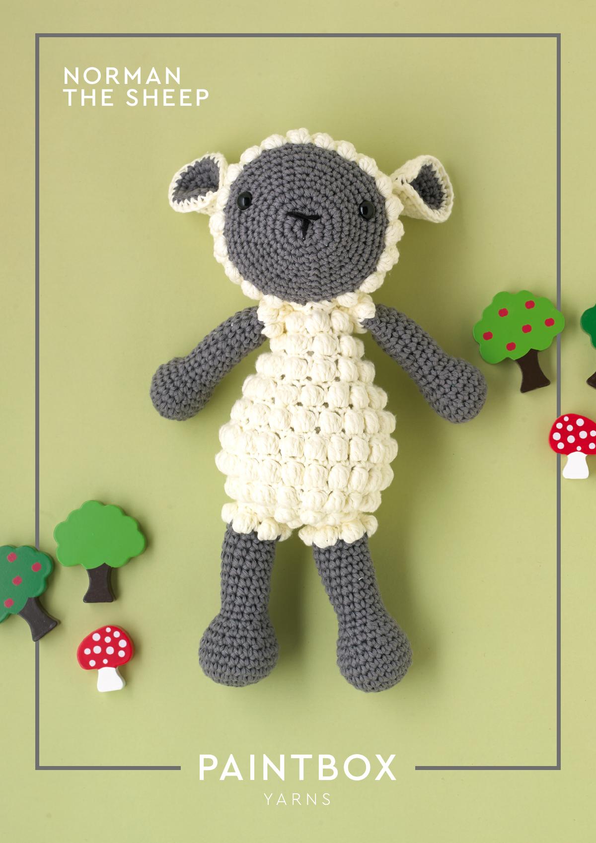 Crochet pattern for Norman the Sheep toy, showing the finished plush sheep.